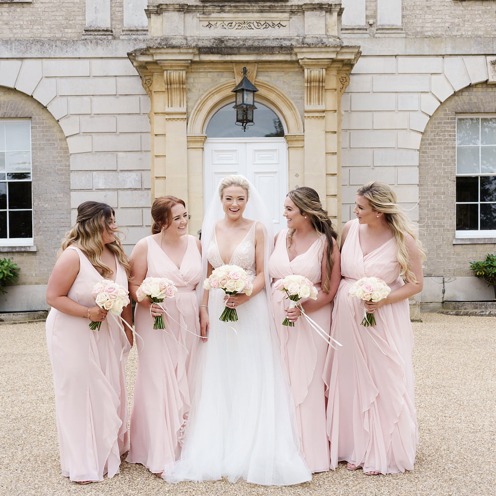 Jessica and Edwards wedding at Hatfield place the bride and her blush bridesmaids